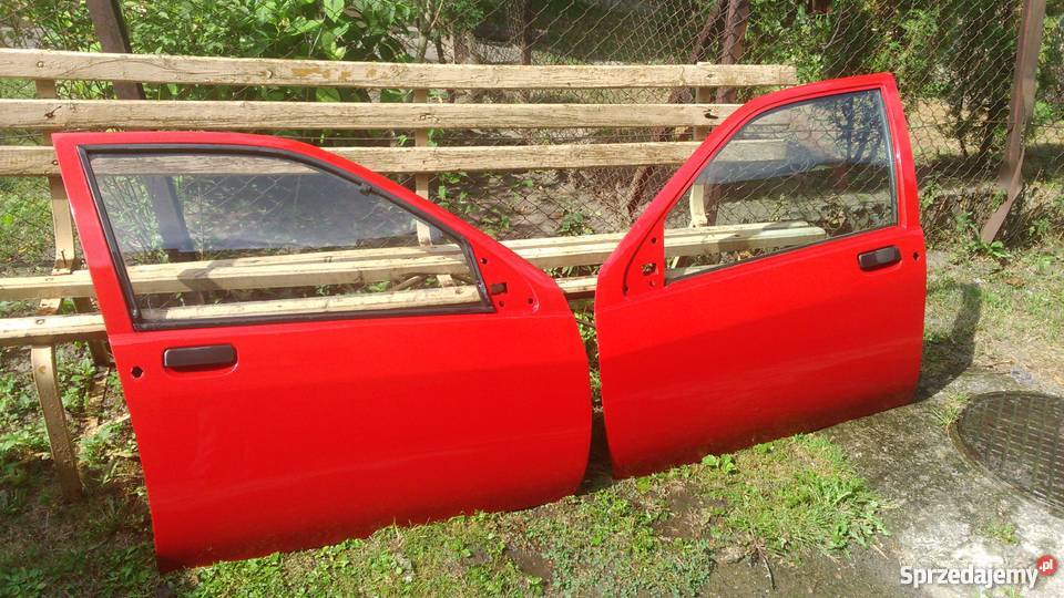 Drzwi lewe i prawe z szybami świeży lakier do Jarosław