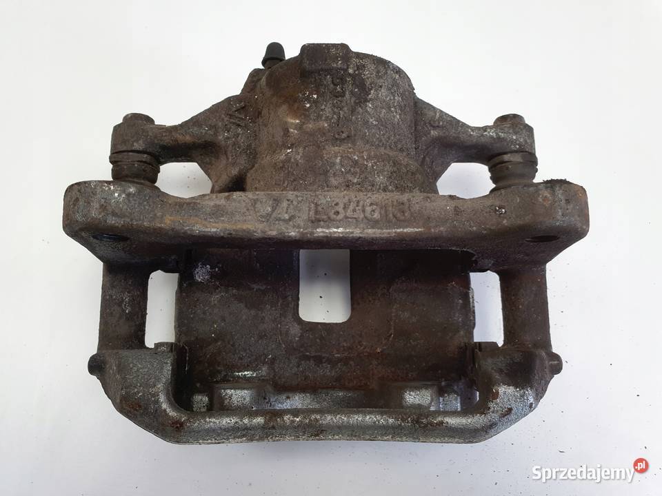 Toyota Corolla XII E21 PRZEDNI ZACISK HAMULCOWY