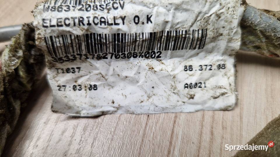 Wzmacniacz Volvo V70ll S60l S80l żółta naklejka Wąsosz