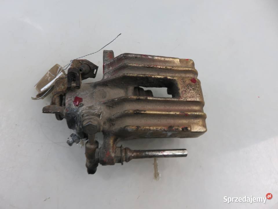 ZACISK LEWY TYŁ SEAT TOLEDO II 19 TDI