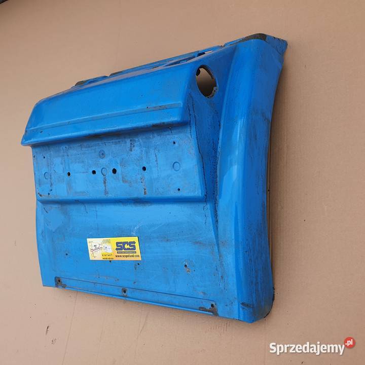 MAN TGX TGA TGS BŁOTNIK CHLAPACZ NA LAMPĘ LEWY Bieleń