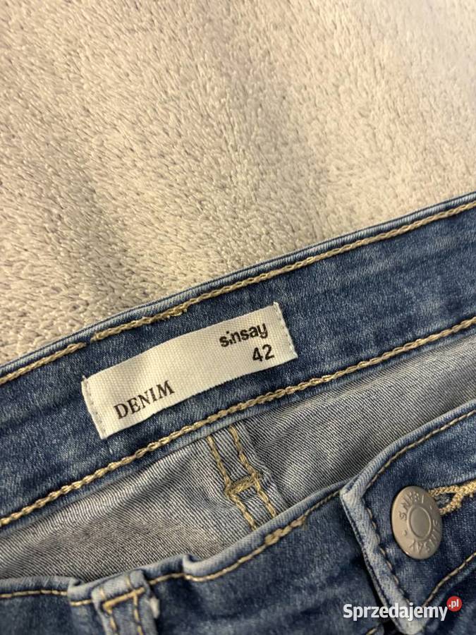 Spodnie jeansowe jeansy dżinsy niebieskie rurki Jasło