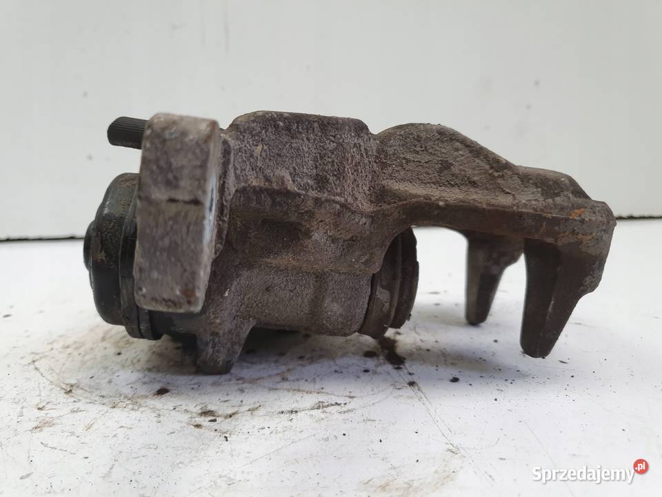 Toyota Corolla XII E21 TYLNY ZACISK HAMULCOWY Janów