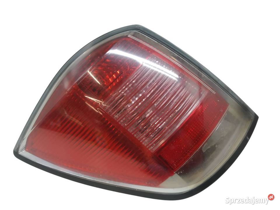LAMPA TYŁ LEWA KOMBI 93182992 Opel Astra III