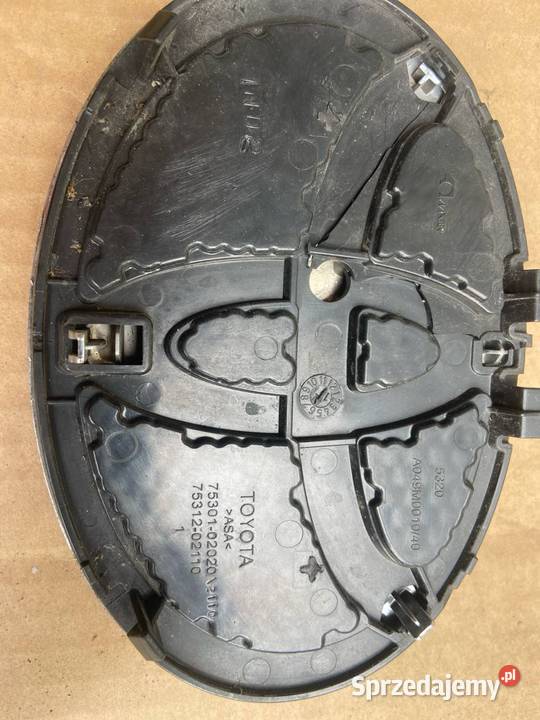 ZNACZEK EMBLEMAT TOYOTA AURIS I 7530102070 Marki