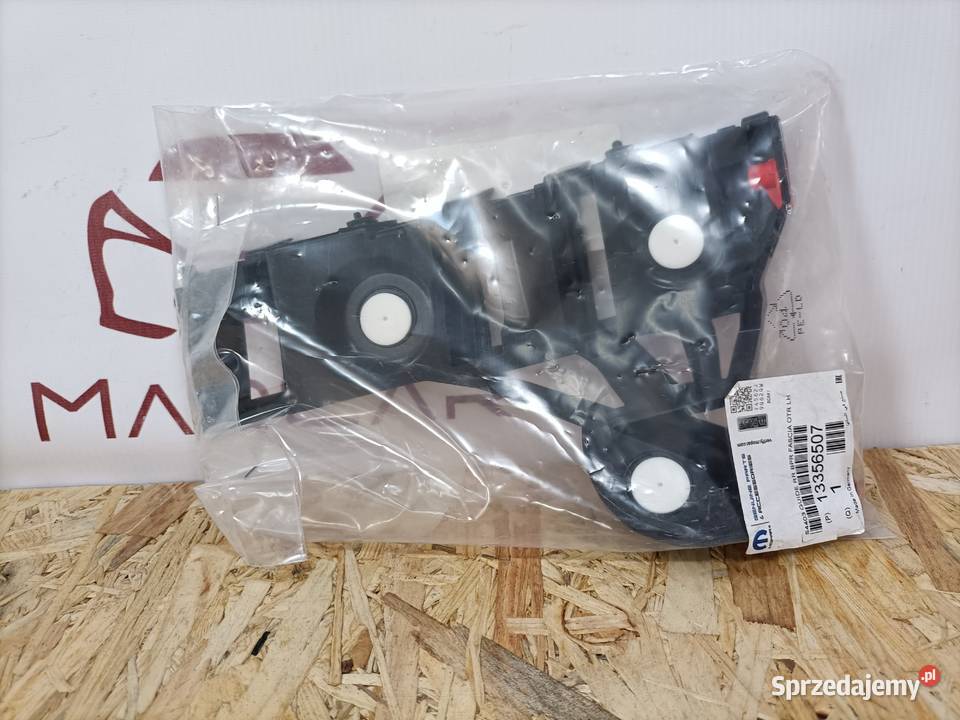 OPEL ADAM 13 ŚLIZG MOCOWANIE ZDERZAKA LEWY TYŁ Pleszew