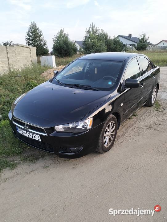 Mitsubishi Lancer Exclusive Invite 16