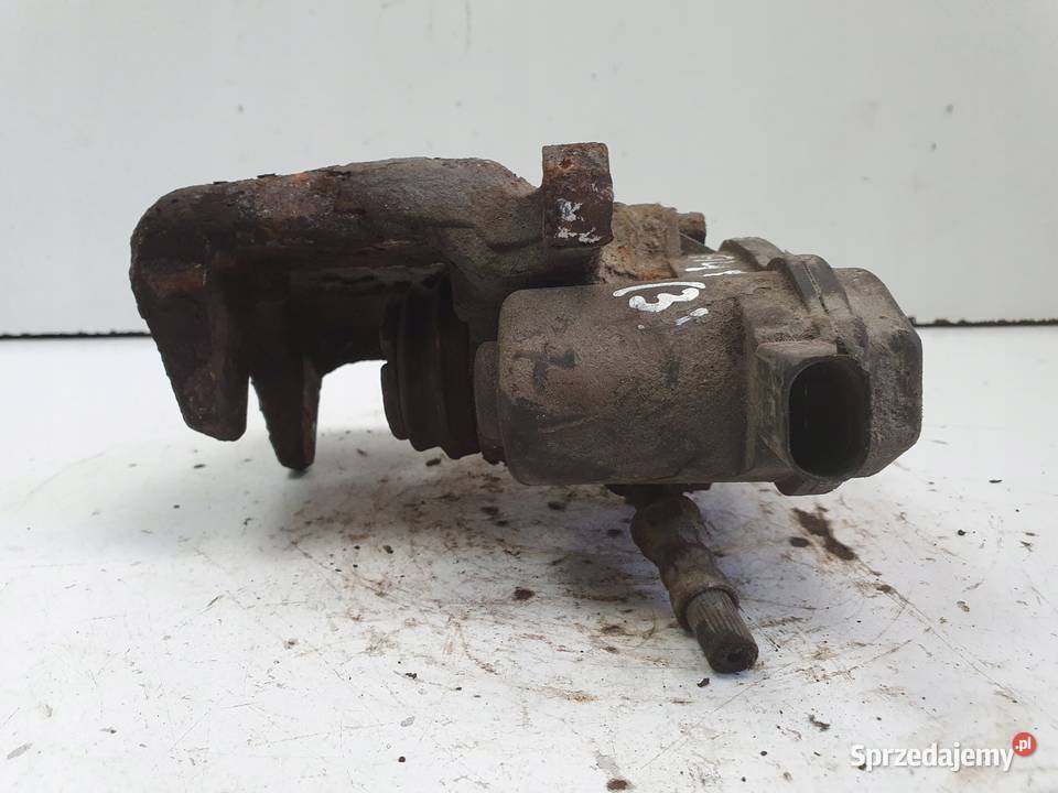 Audi A4 B8 TYLNY ZACISK HAMULCOWY prawy tył Janów