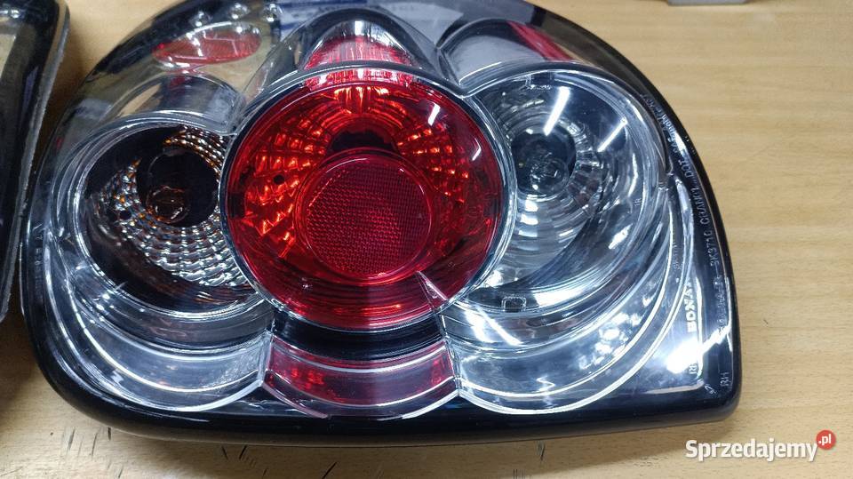 Lampy tył nowe Chrysler Voyager 0107 Dodge Grand osobowe Lampy tylne śląskie Częstochowa