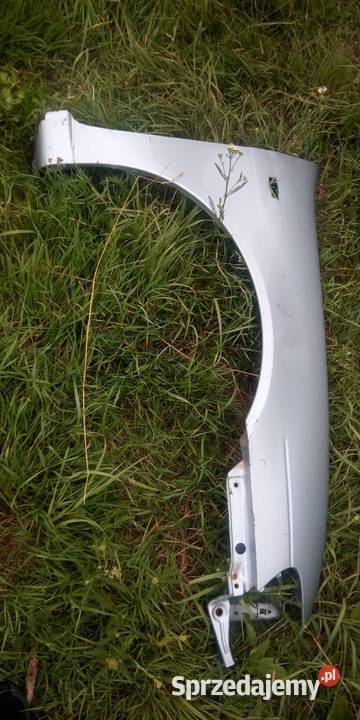 Błotnik przedni prawy NISSAN ALMERA srebrny Margonin