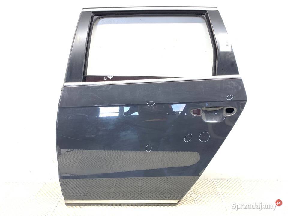 DRZWI LEWY TYŁ VW PASSAT B7 Kombi 1015 Uranograu