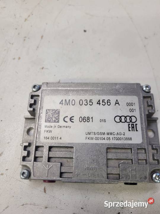 WZMACNIACZ ANTENOWY AUDI A4 A5 A6 Q7 4M0035456A Przystajń