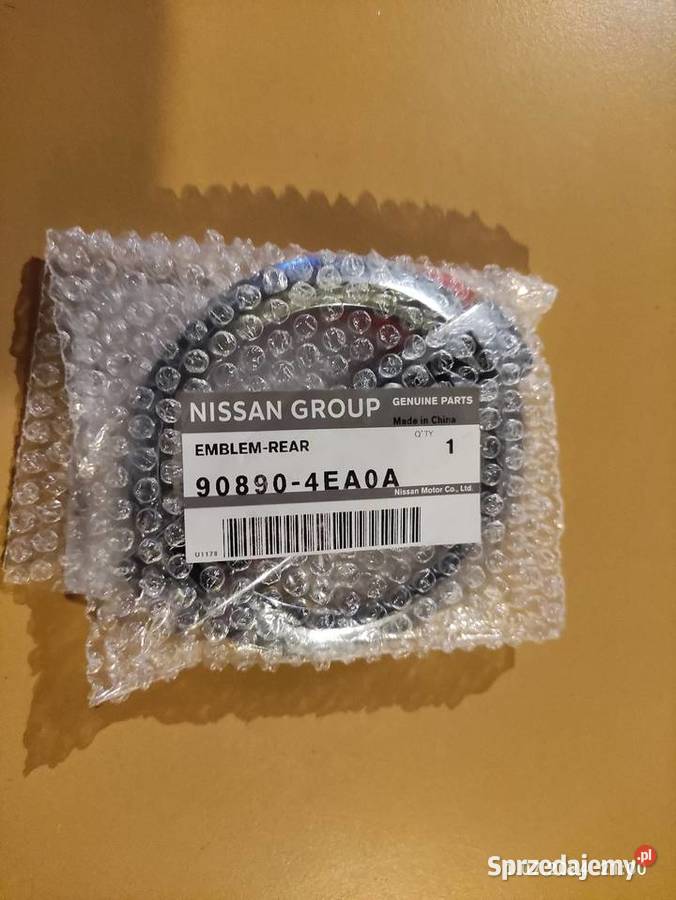 NISSAN QASHQAI J11 ZNACZEK tył EMBLEMAT Brzesko