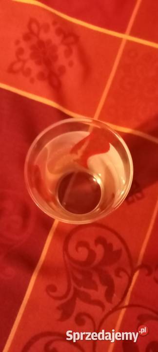 Szklanka coca cola słońce z zieloną wstęgą Warszawa