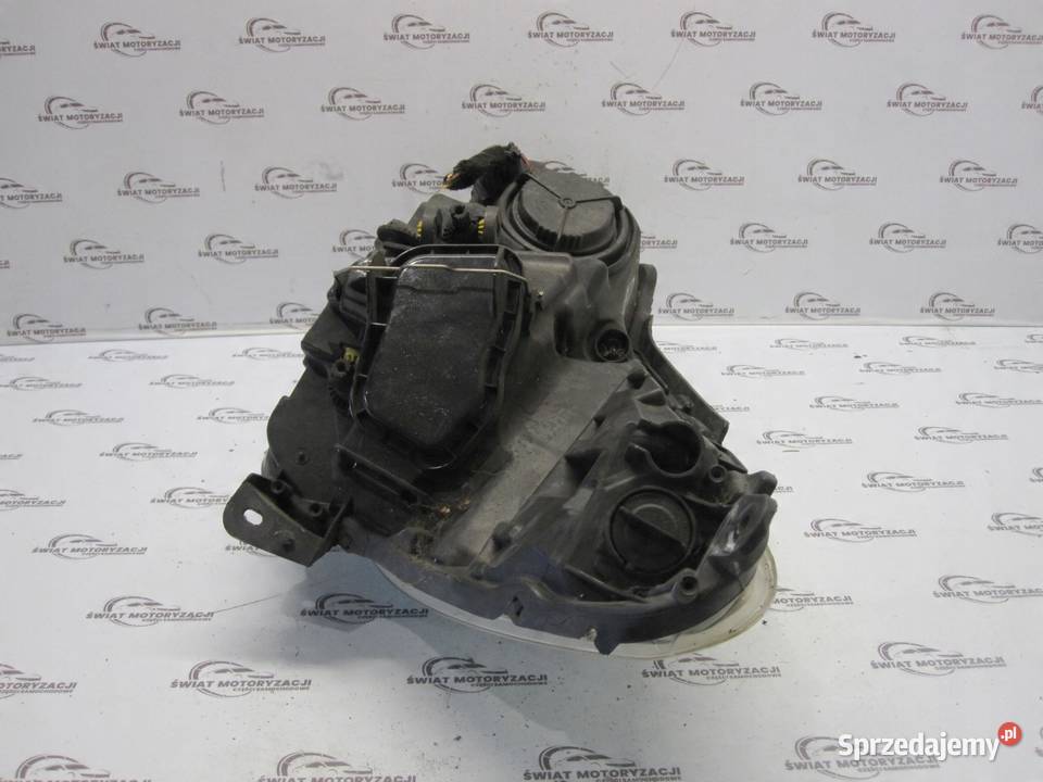 OPEL CORSA D lampa prawa przód 13432892 90003113