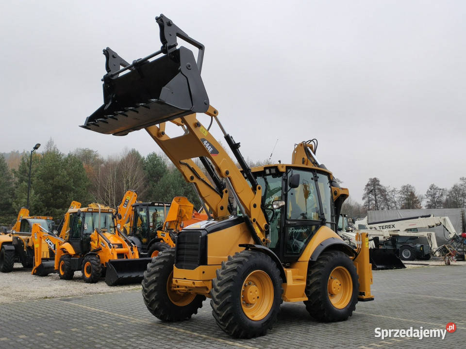 na równych kołach Caterpillar 444E Premier Motoryzacja Widełki