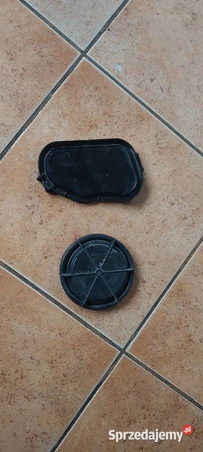 Zaślepka lampy przód Opel Corsa D 89391393