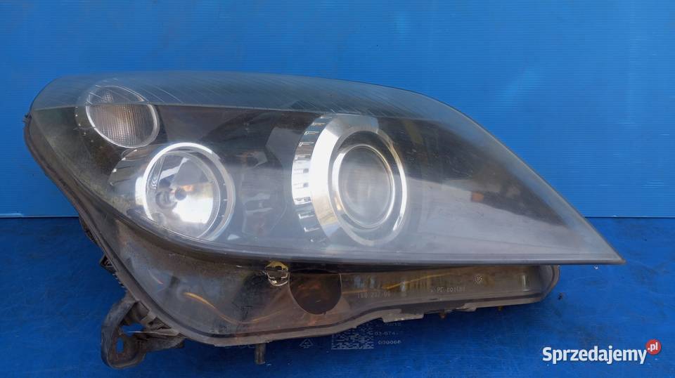 LAMPA PRAWY PRZÓD EUROPA XENON OPEL ASTRA H III Lampy przednie Nowy Tomyśl