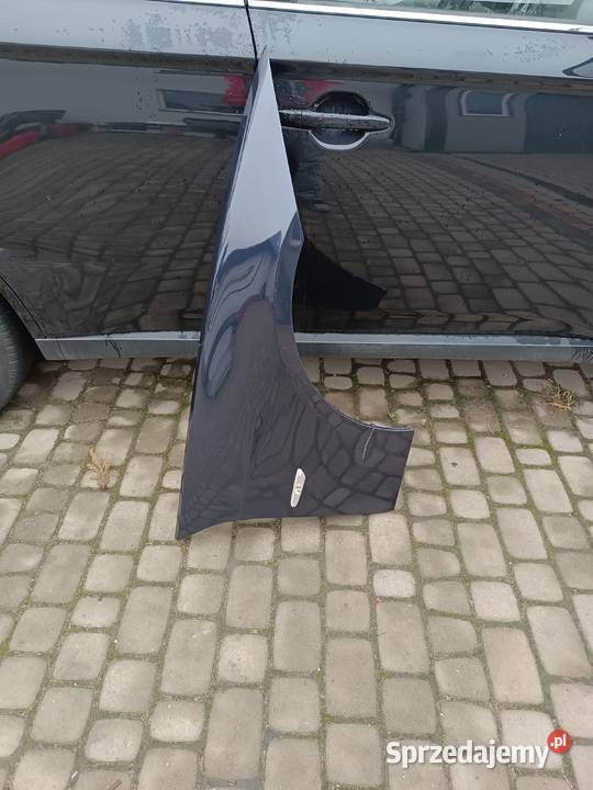 Błotnik prawy BMW E90 E91 Radom