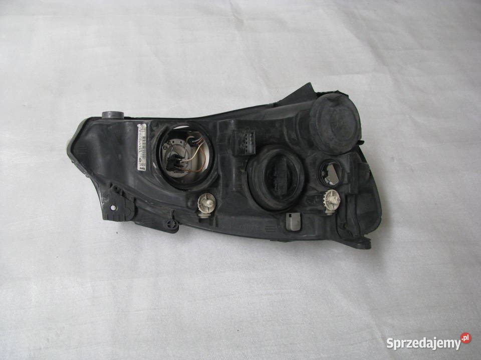 Reflektor Lewy Opel Corsa C 13115006