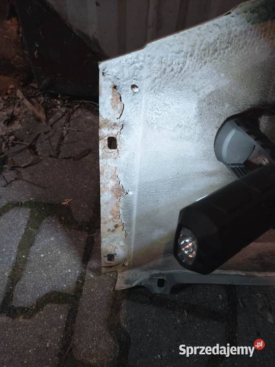 Oryginalny prawy przedni błotnik W124 C124