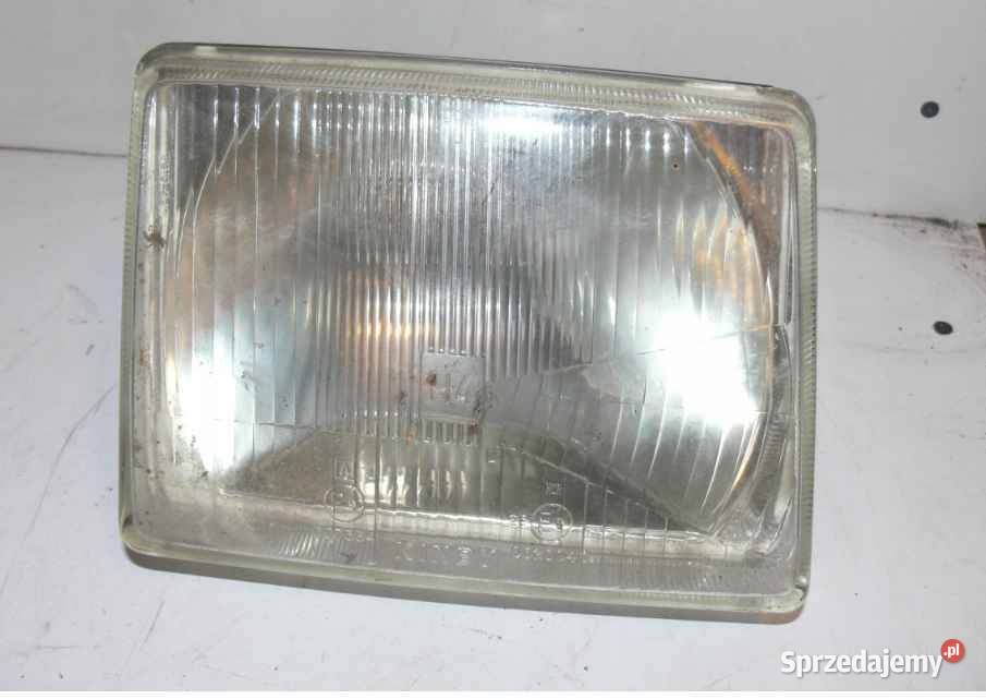 OPEL CORSA A LAMPA REFLEKTOR LEWY ORYGINAŁ NUMER
