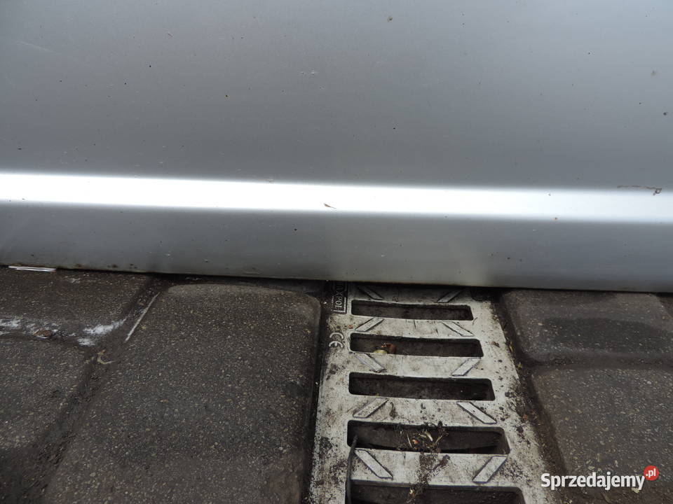 DRZWI LEWY PRZÓD TOYOTA YARIS I HB FL 1E7 osobowe małopolskie Nowy Sącz