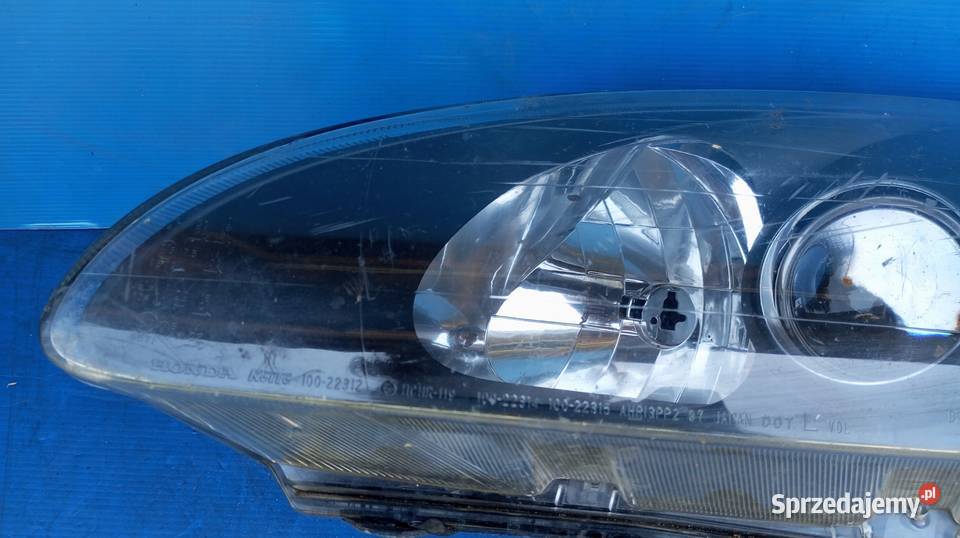 LAMPA LEWY PRZÓD REFLEKTOR EU XENON 10022312 Nowy Tomyśl