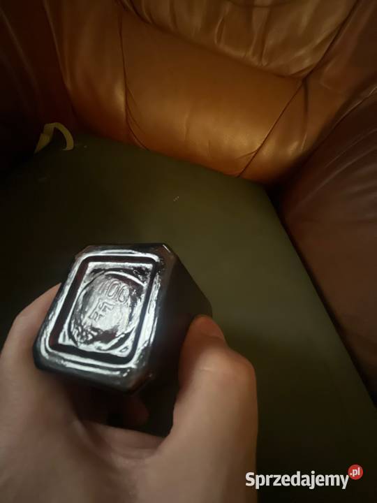 Brązowa buteleczka ze szlifem i szklanym korkiem