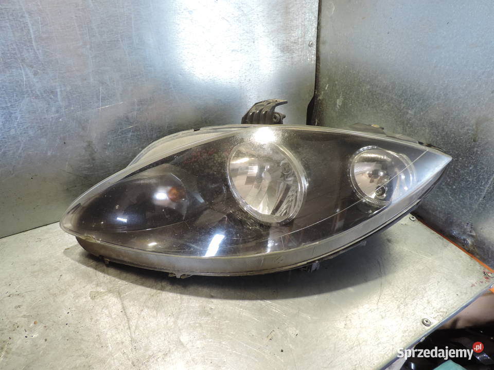 SEAT LEON 2 II REFLEKTOR LAMPA LEWY PRZÓD