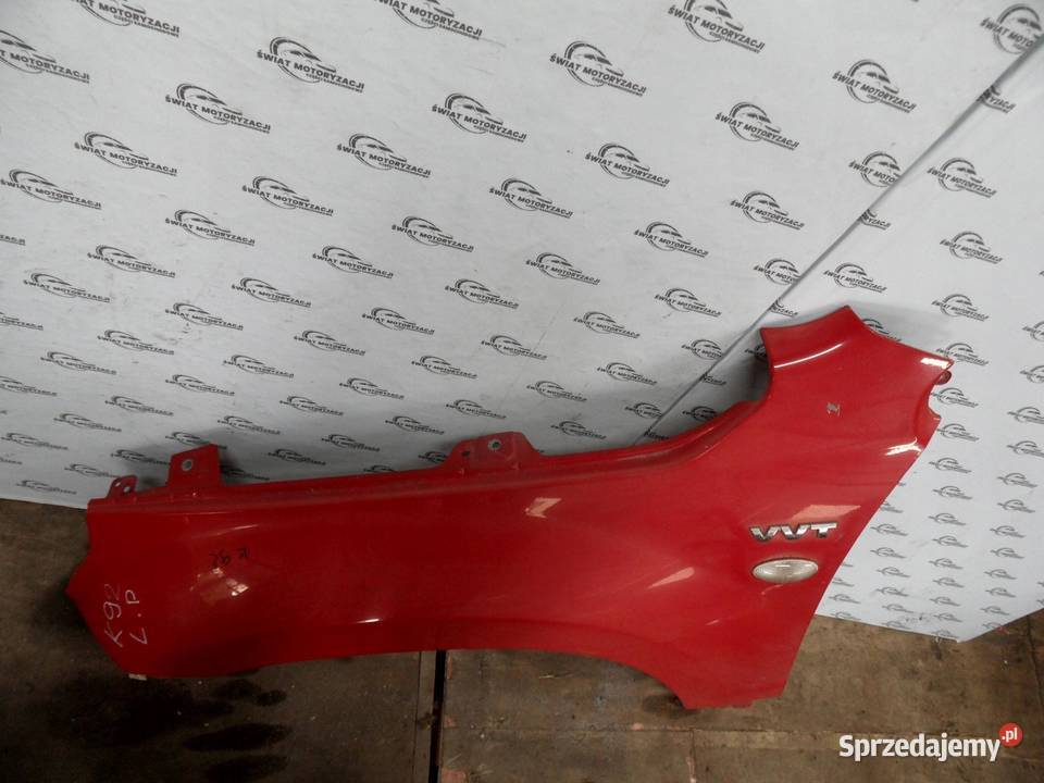 SUZUKI GRAND VITARA II 06r błotnik lewy przód
