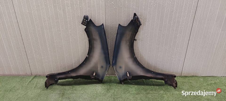 BŁOTNIK LEWY PRZÓD SUZUKI SX4 FIAT SEDICI 0614 Międzychód