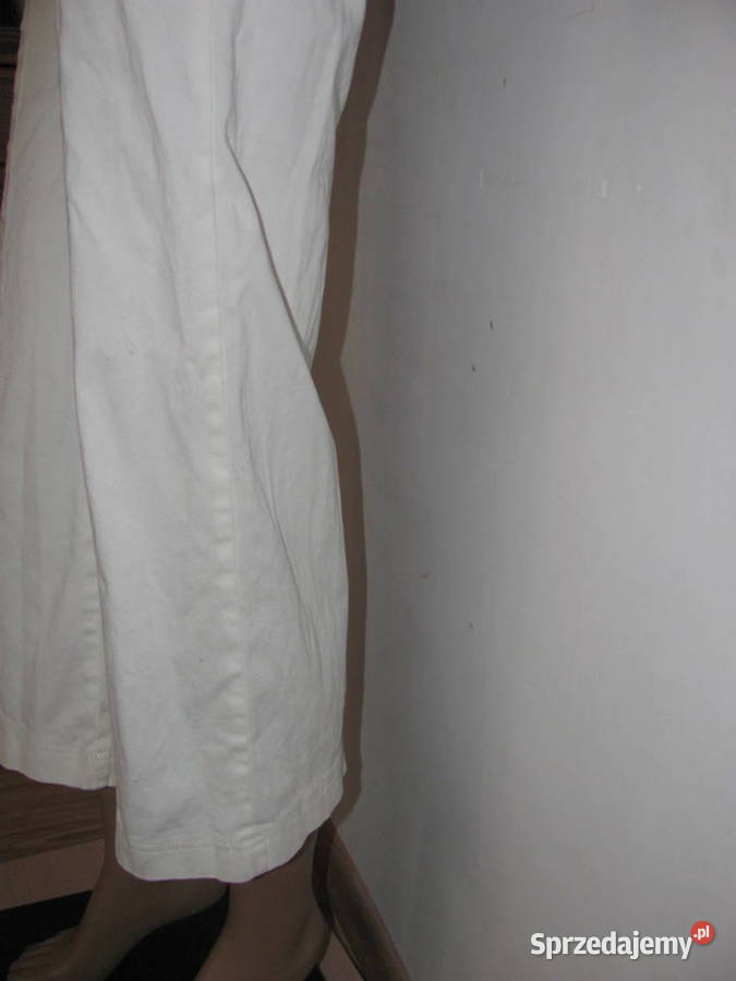 Kombinezon bez rękawów dzwony kremowe spodnie Zamość