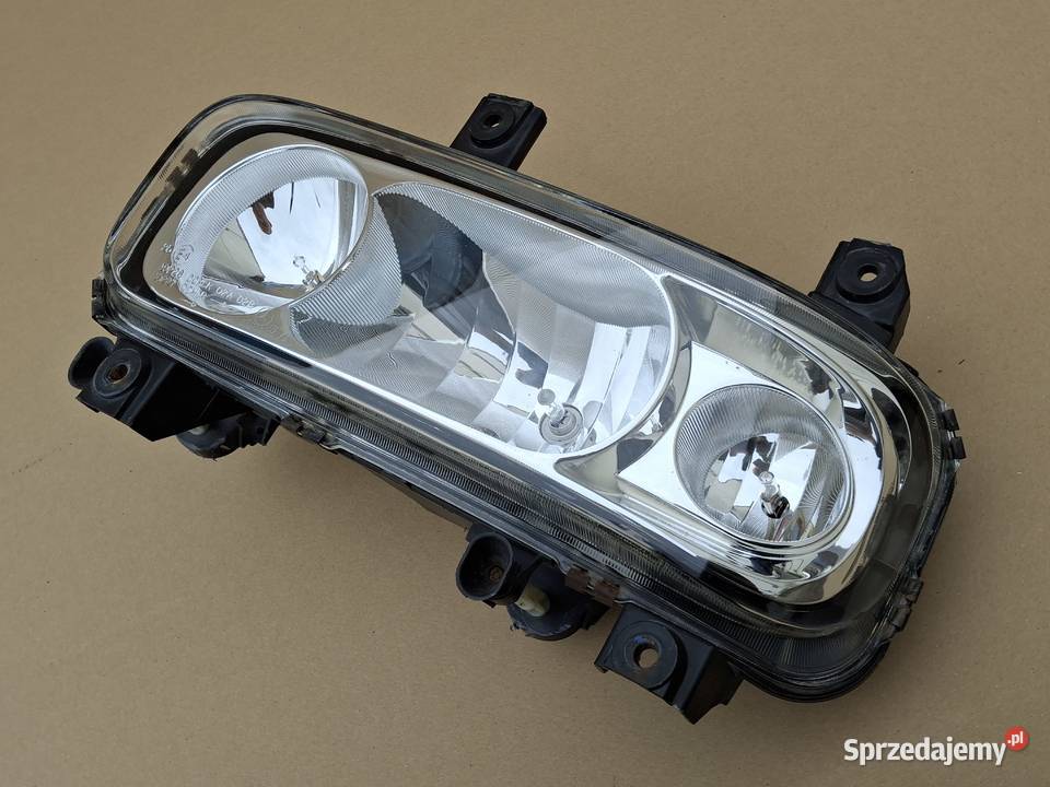 MERCEDES ATEGO REFLEKTOR LEWY ORYGINAŁ LAMPA Lampy przednie