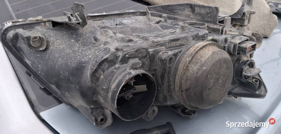 Saab 93 2005r lampa lampy przód przednia lewa