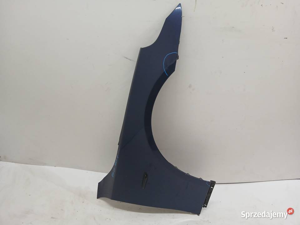 BŁOTNIK PRAWY PRZEDNI BMW E60 A765 TIEFSEEBLAU osobowe Strzyżewice