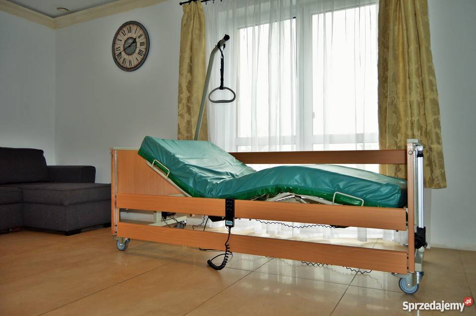 łóżko rehabilitacyjne z materacem i wysięgnikiem
