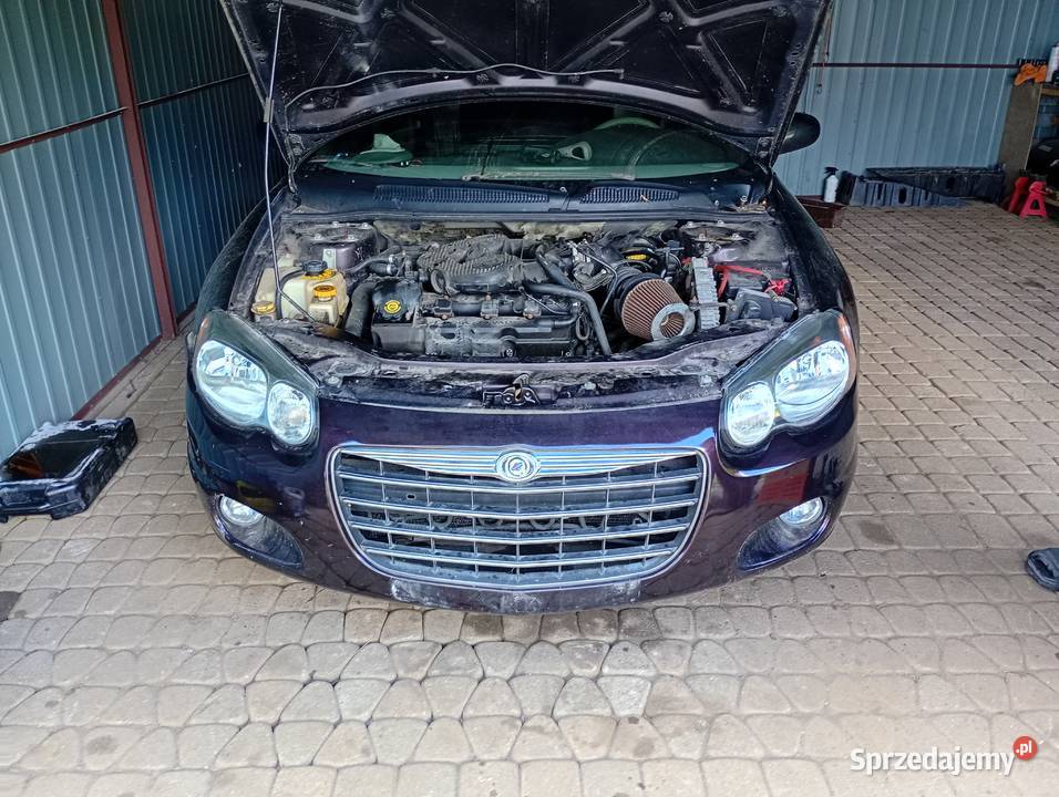 Lampy przednia chrysler sebring cabrio 2003 Części samochodowe śląskie Sarnów