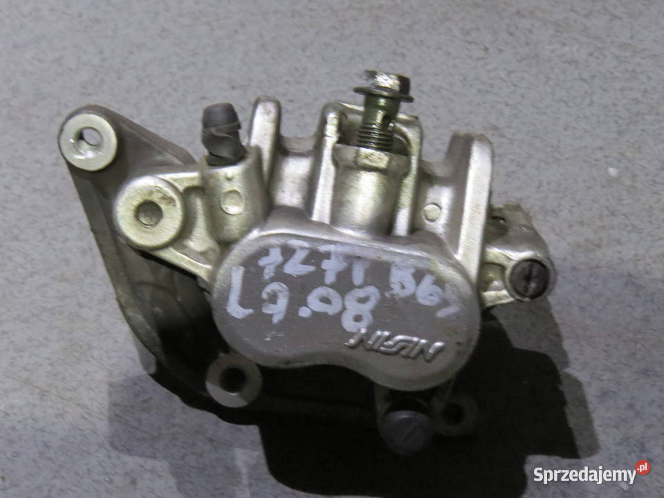 SUZUKI BURGMAN 650 LEWY ZACISK HAMULCA HAMULEC