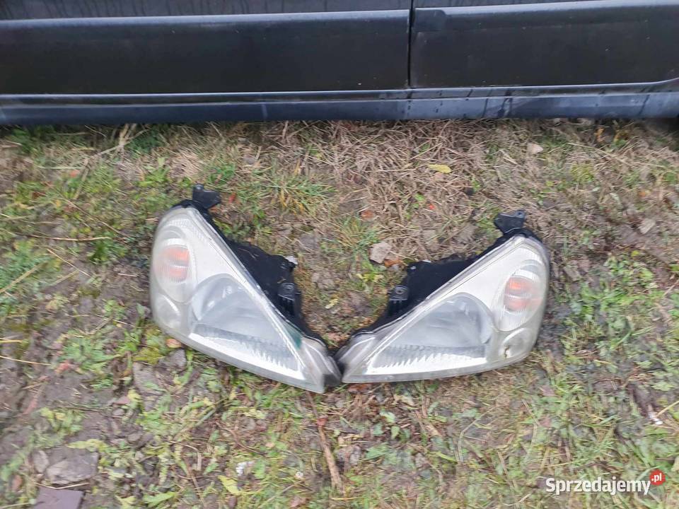 Lampa przednia reflektor prawa lewa Suzuki Liana Lampy przednie