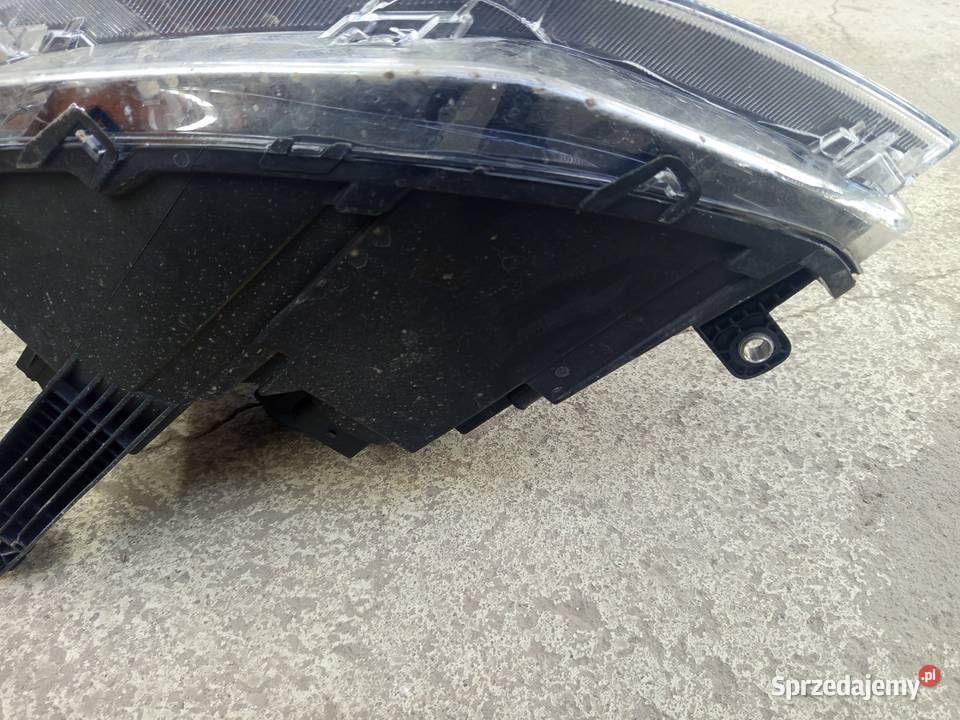 Reflektor prawy VW caddy 20 roku orginalny