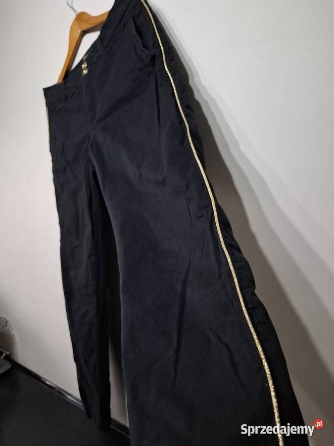 Spodnie L Ochnik czarne Rozmiar 40(L) Moda i Styl