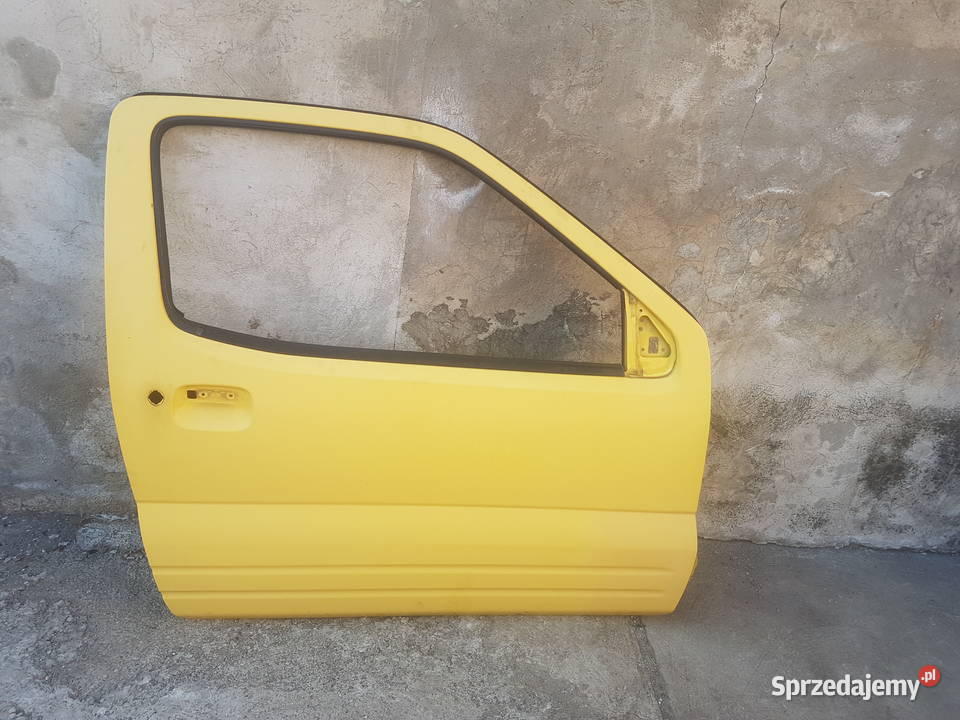 Suzuki Ignis FH 0003 drzwi przód przedni żółty