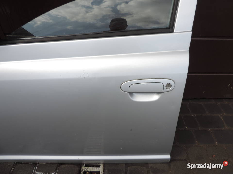 DRZWI LEWY PRZÓD TOYOTA YARIS I HB FL 1E7 Nowy Sącz