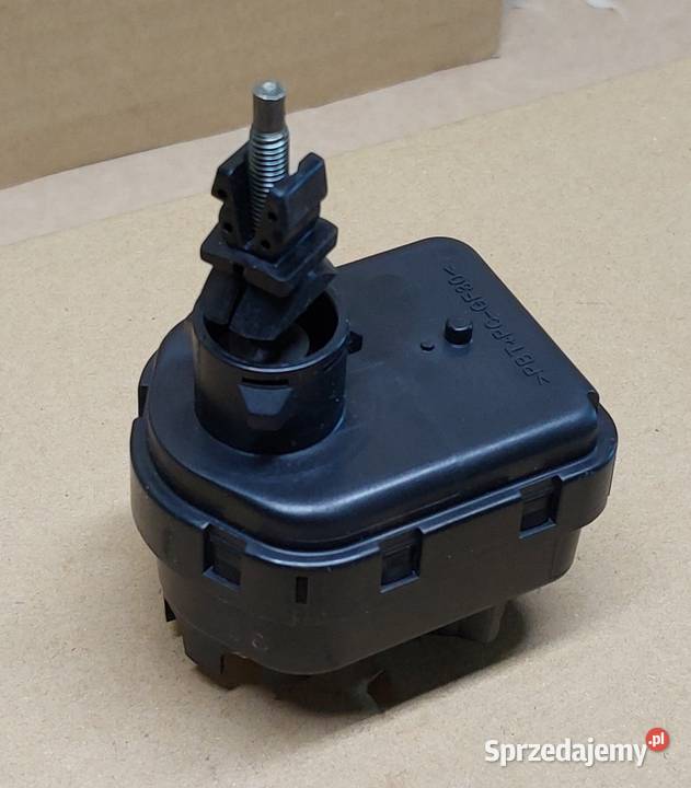 SILNICZEK REGULACJI LAMPY TOYOTA PREVIA 0005 Mielęcin