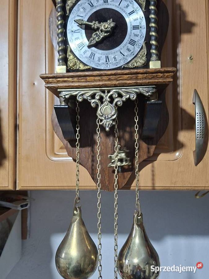 Wiszący zegar Atlas holenderski drewno Zegary