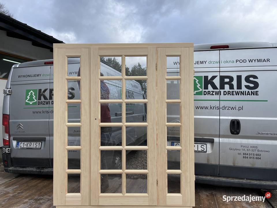 Drzwi zewnętrzne drewniane z doświetlami w Drewno kujawsko-pomorskie