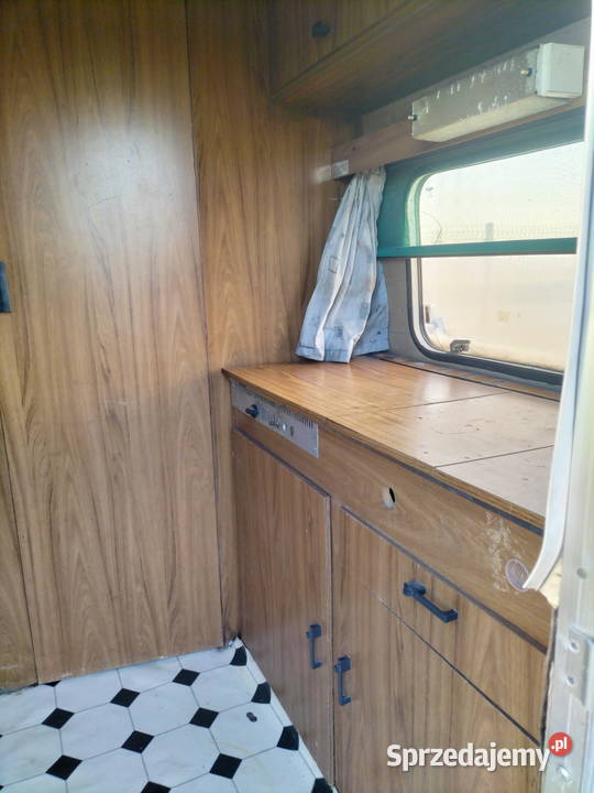 Przyczepa kempingowa na budowę działkę bez