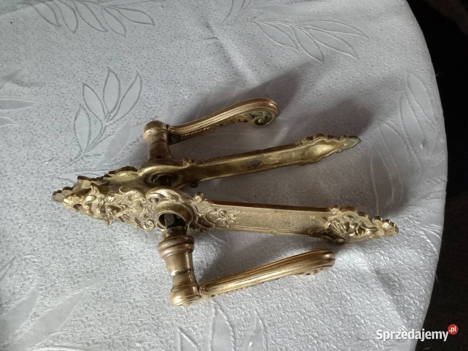 Stare mosiężne ozdobne klamki do drzwi