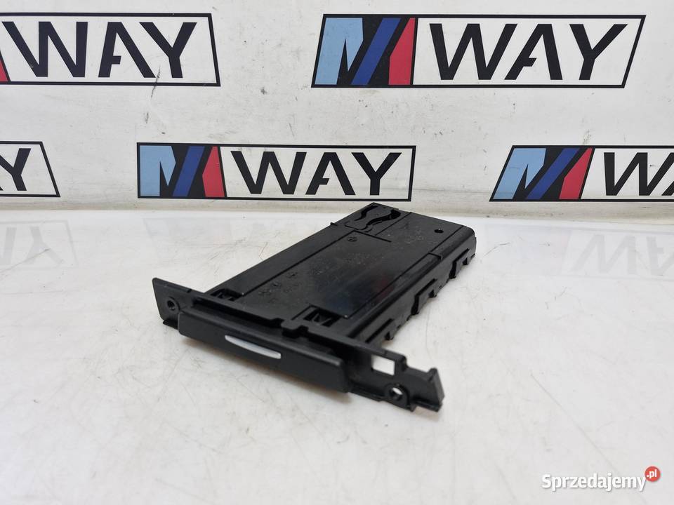 7127461 BMW E91 CUPHOLDER UCHWYT NA KUBEK EUROPA Części samochodowe